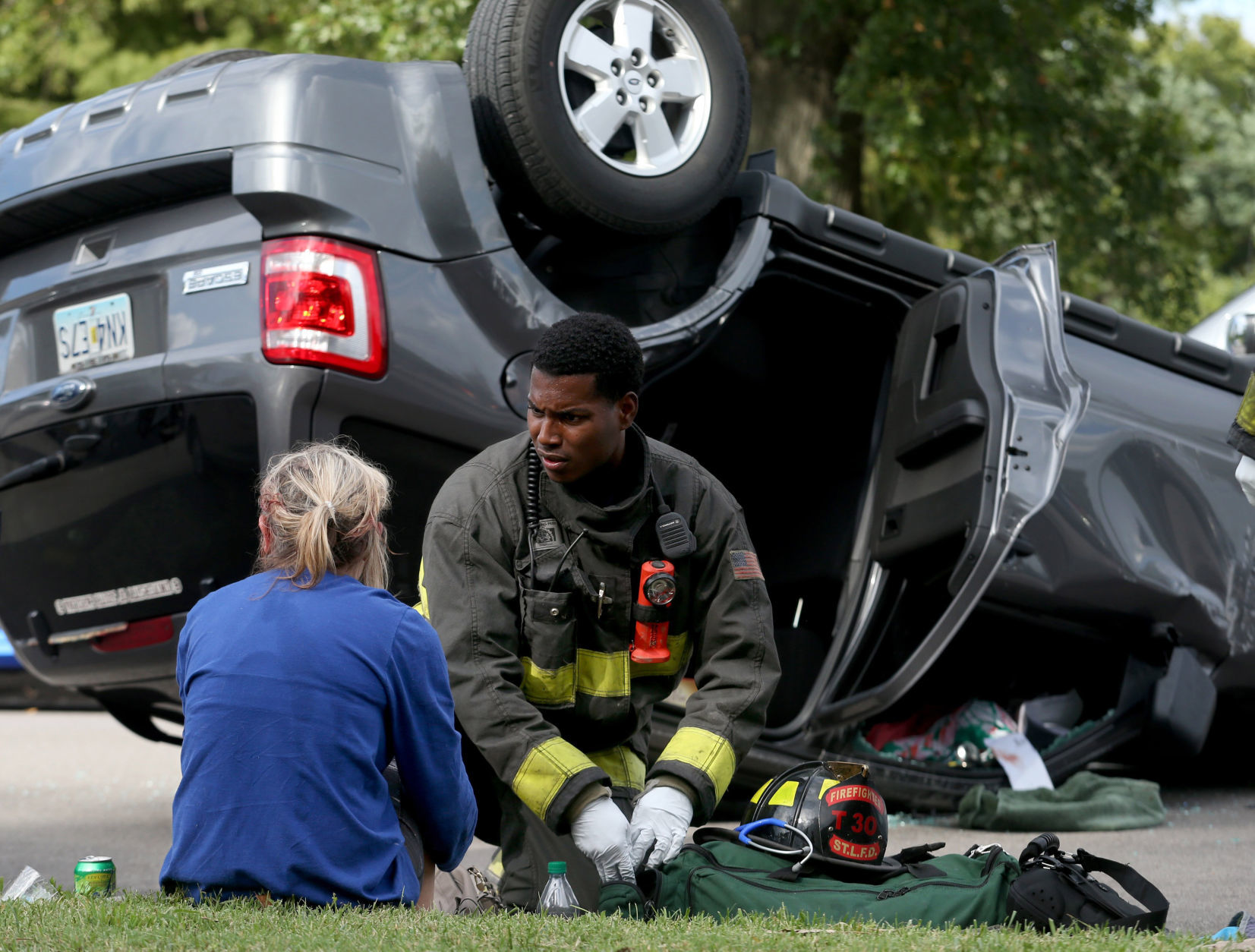 Woman flips her vehicle in Forest Park in one-car accident